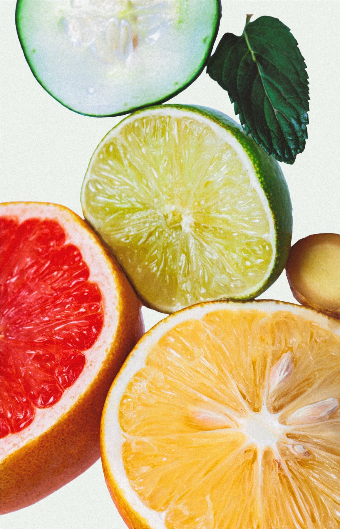 Sliced lime, grapefruit, orange and cucumber
