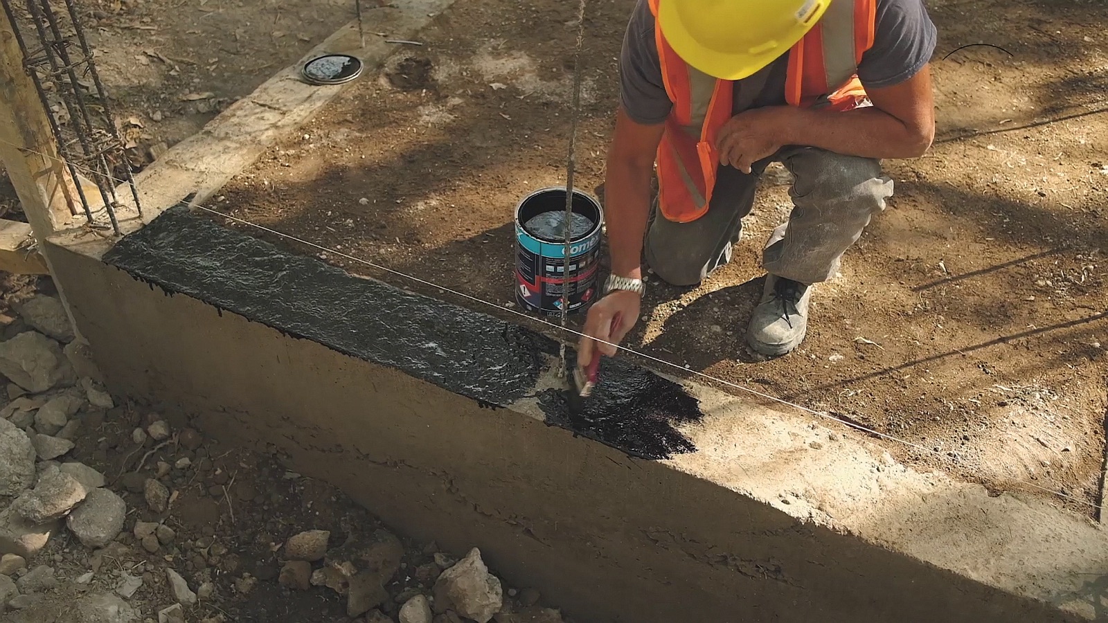 Waterproofing the top of a foundation wall